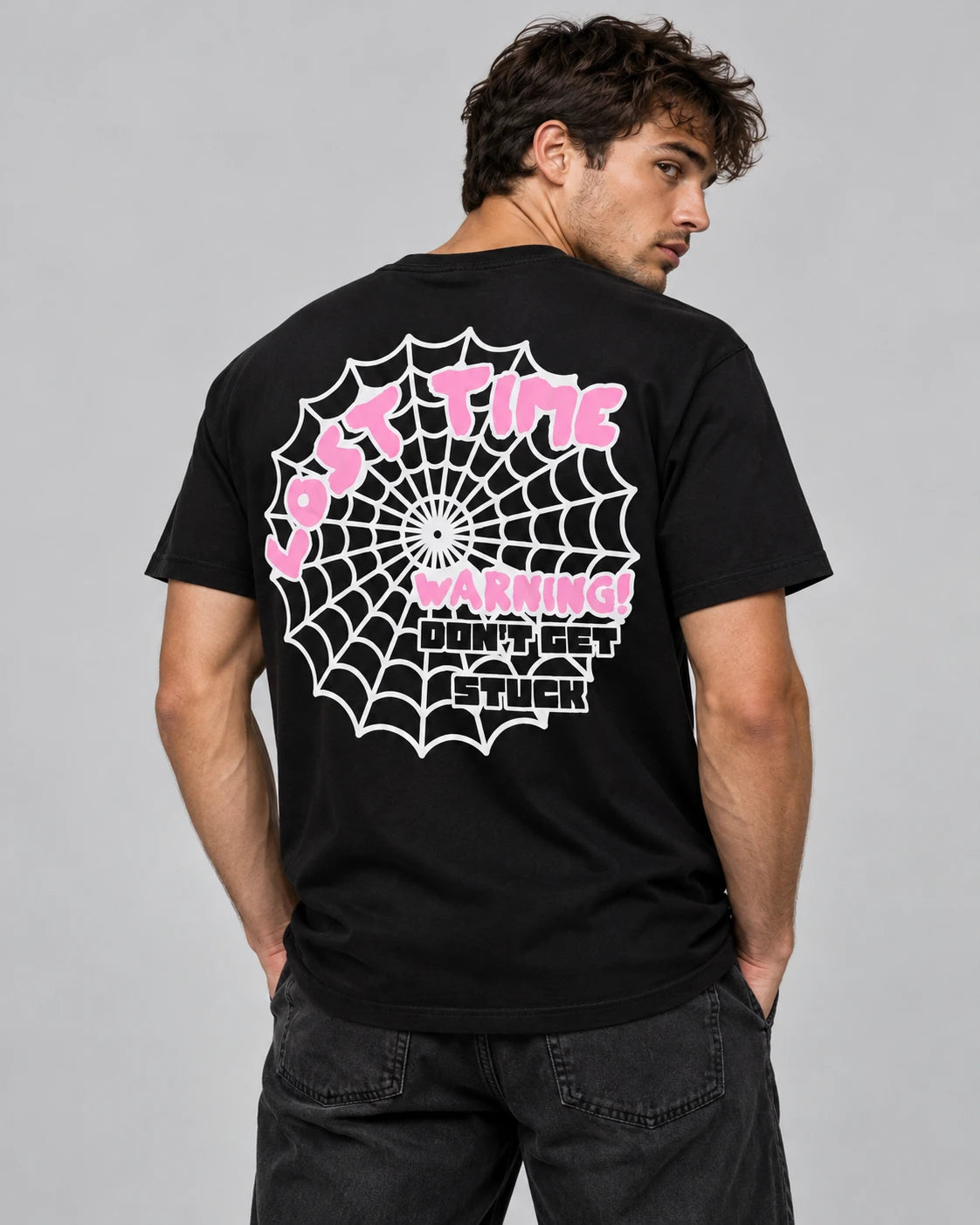 Model wearing “Stuck In Time" Tee BLK (Bubblegum)