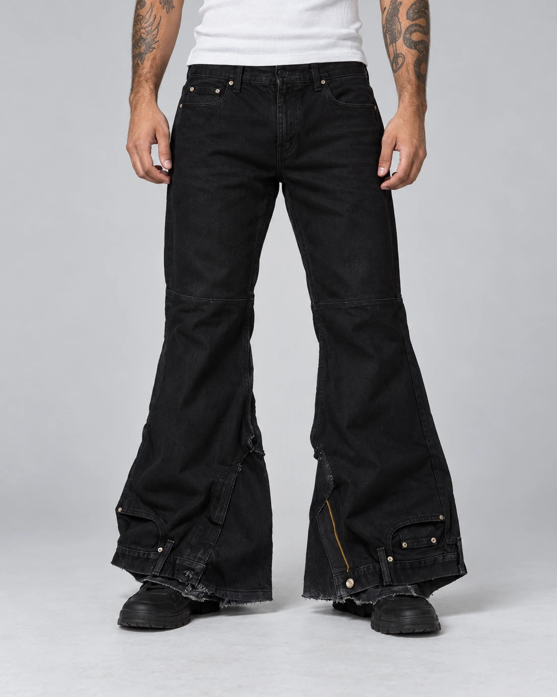 Model wearing BLACK REVERSED BOOTCUT JEANS