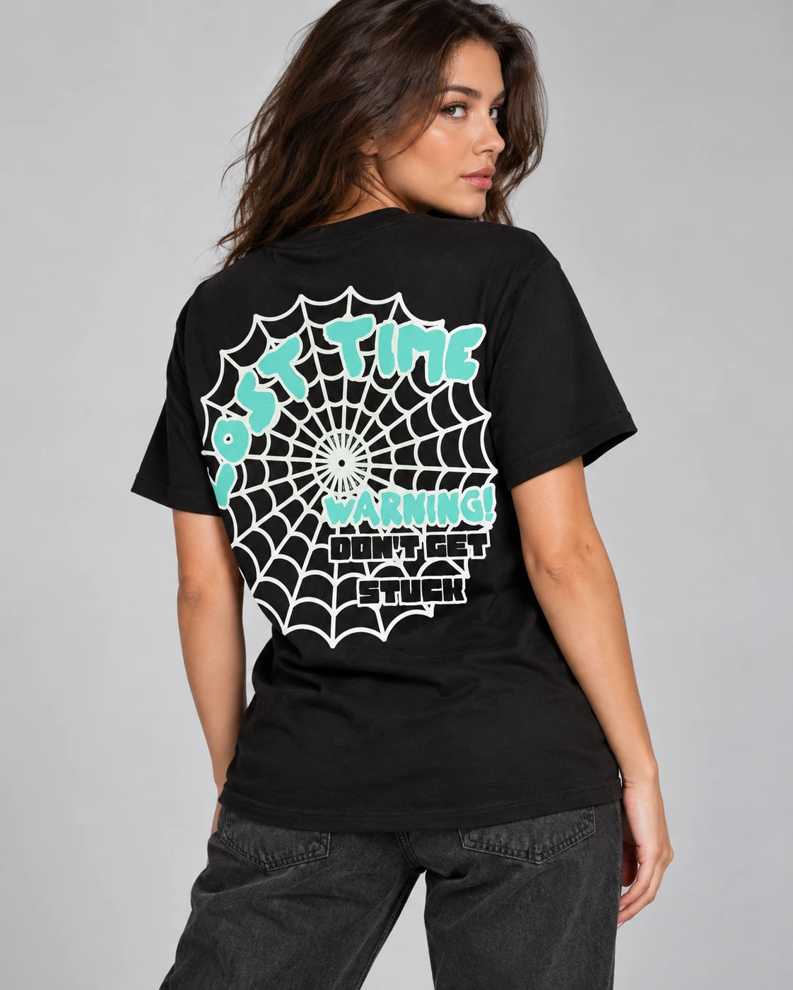 Model wearing "Stuck In Time" Tee BLK (Teal)