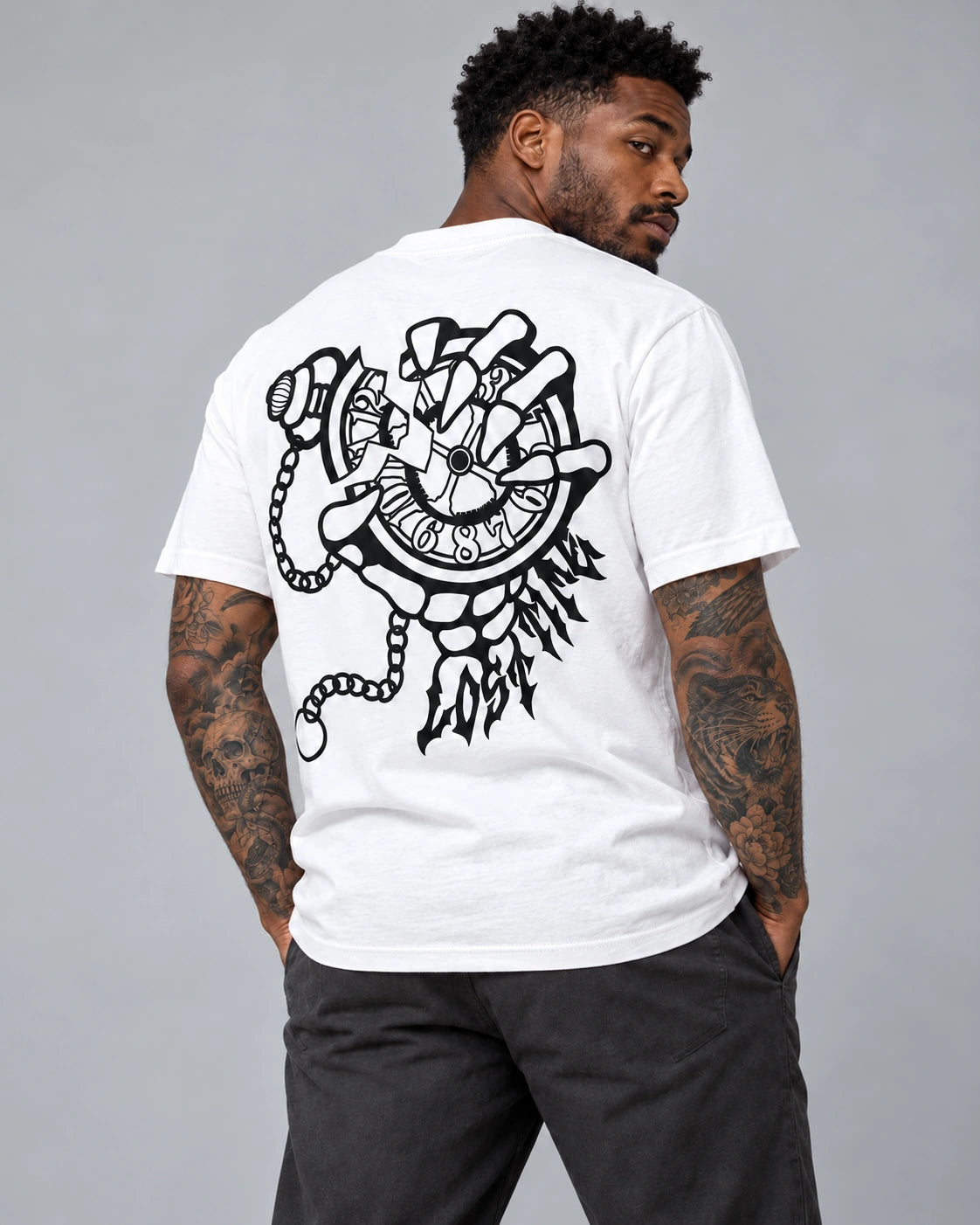 Model wearing Killin’ Time Tee — White