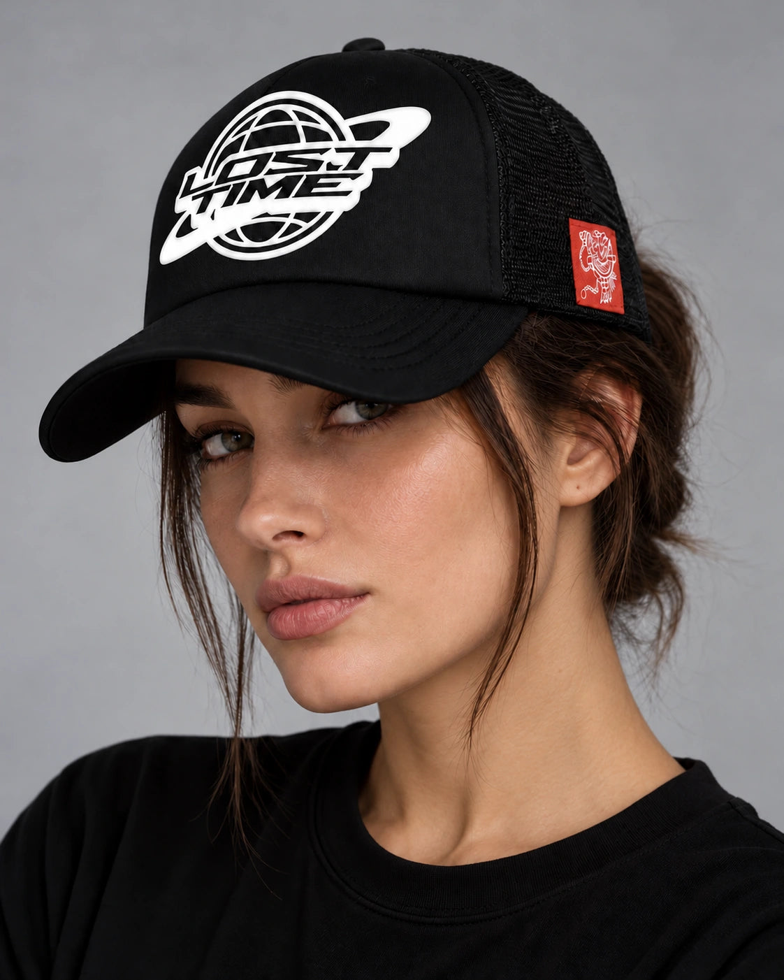 Model wearing LT Worldwide Trucker Hat